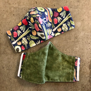fresh vegetables face mask outside and inside view, showing the inside olive green fabric