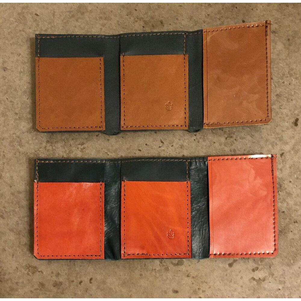 Leather Tri-fold Wallets, teal with brown pockets and shiny teal with bright orange pockets
