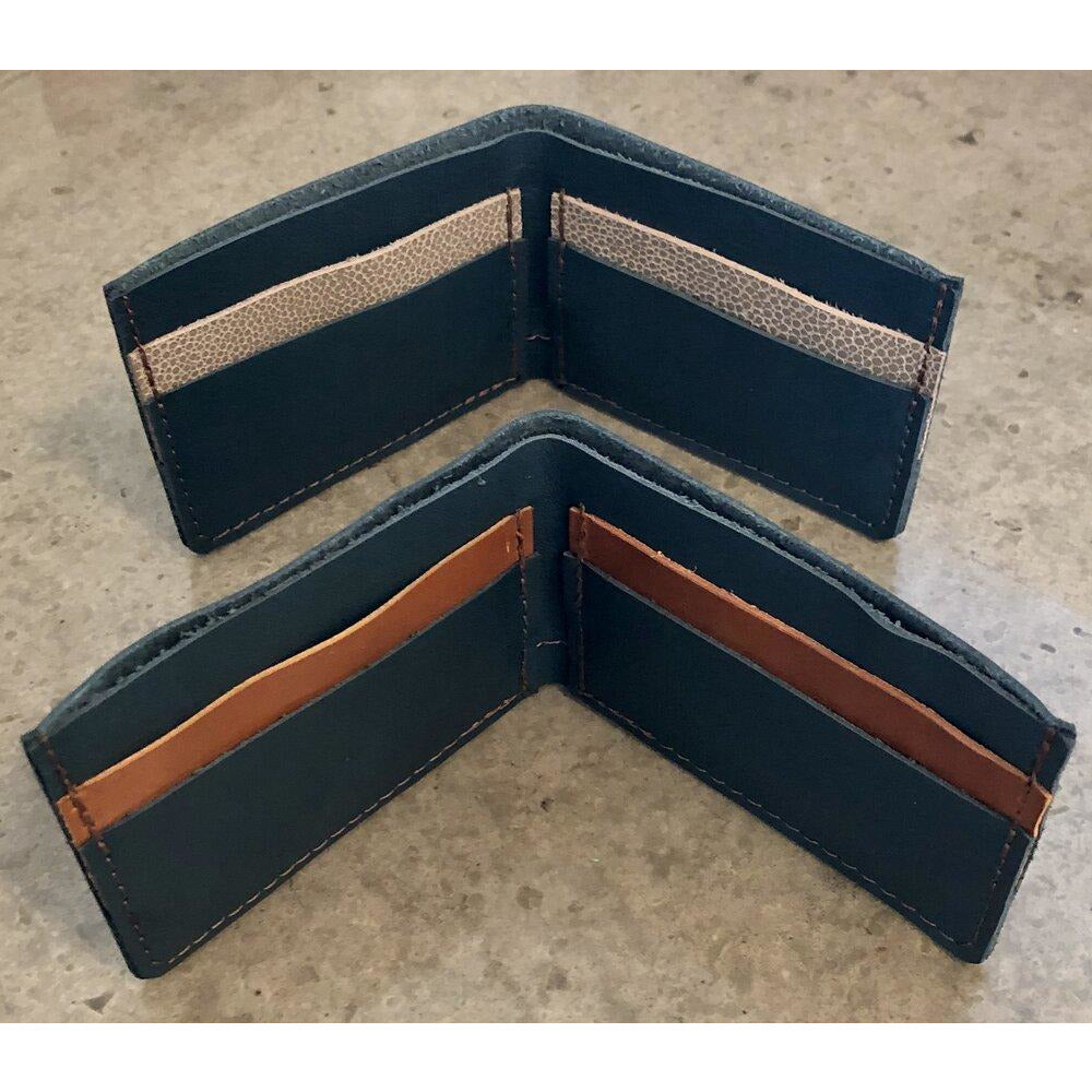 Classic Leather Billfold in Teal Green, pictured with brown and spotted off-white pockets