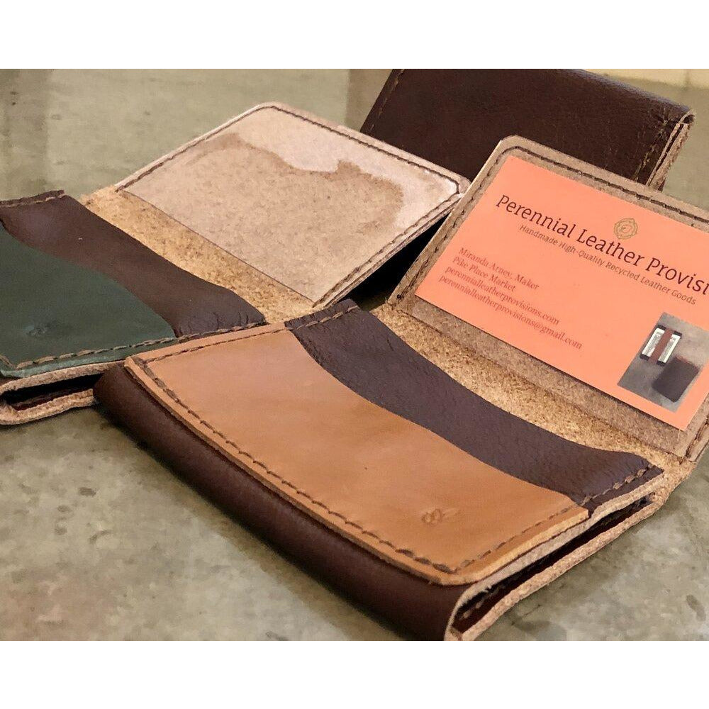Leather Flip Pouch in Dark Brown, pictured with brown and green pockets