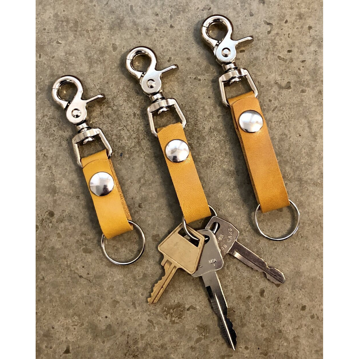 Leather Key Chain in Yellow: short, medium, and long