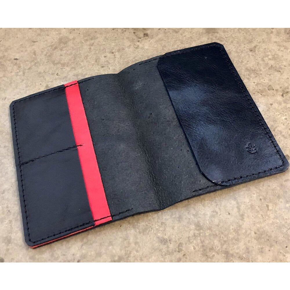 Leather Passport Wallet in black with red pocket accent